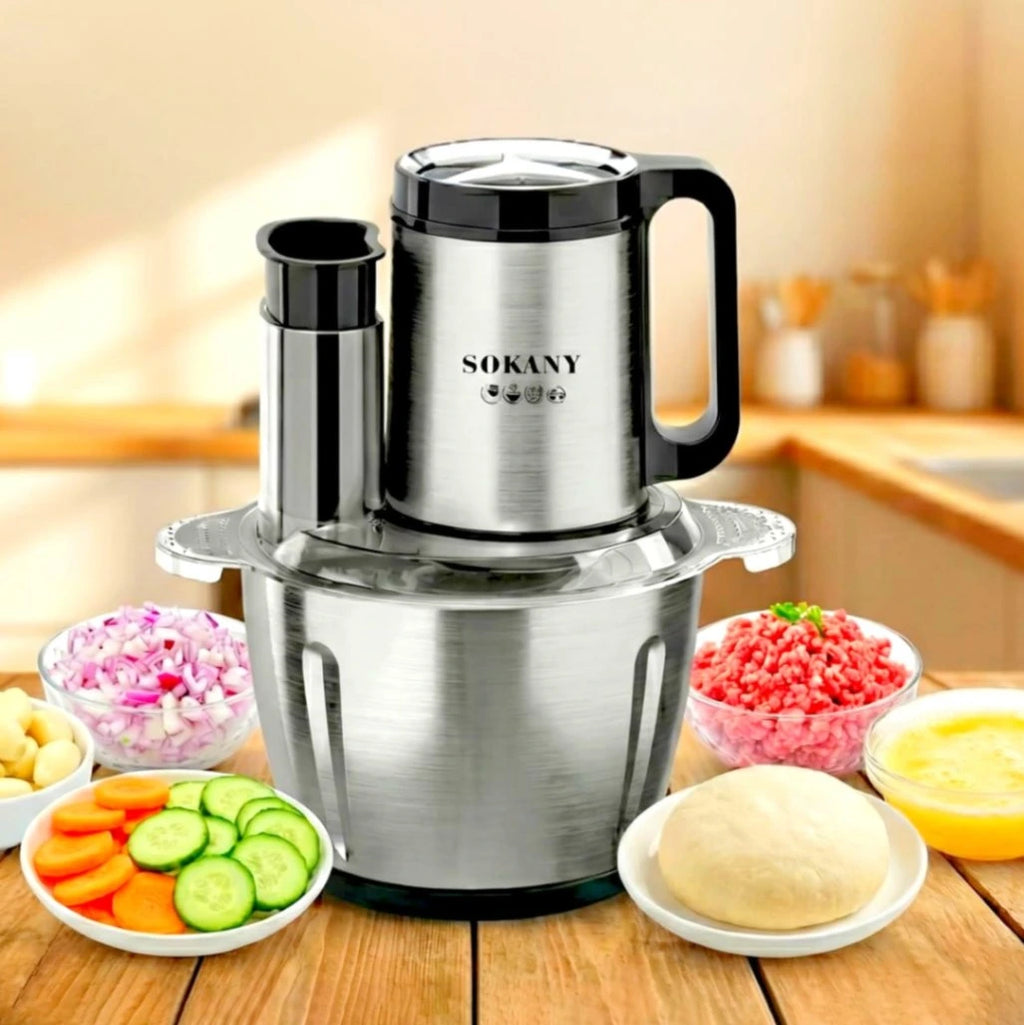 SOKANY food chopper on a kitchen counter with various chopped ingredients around it.