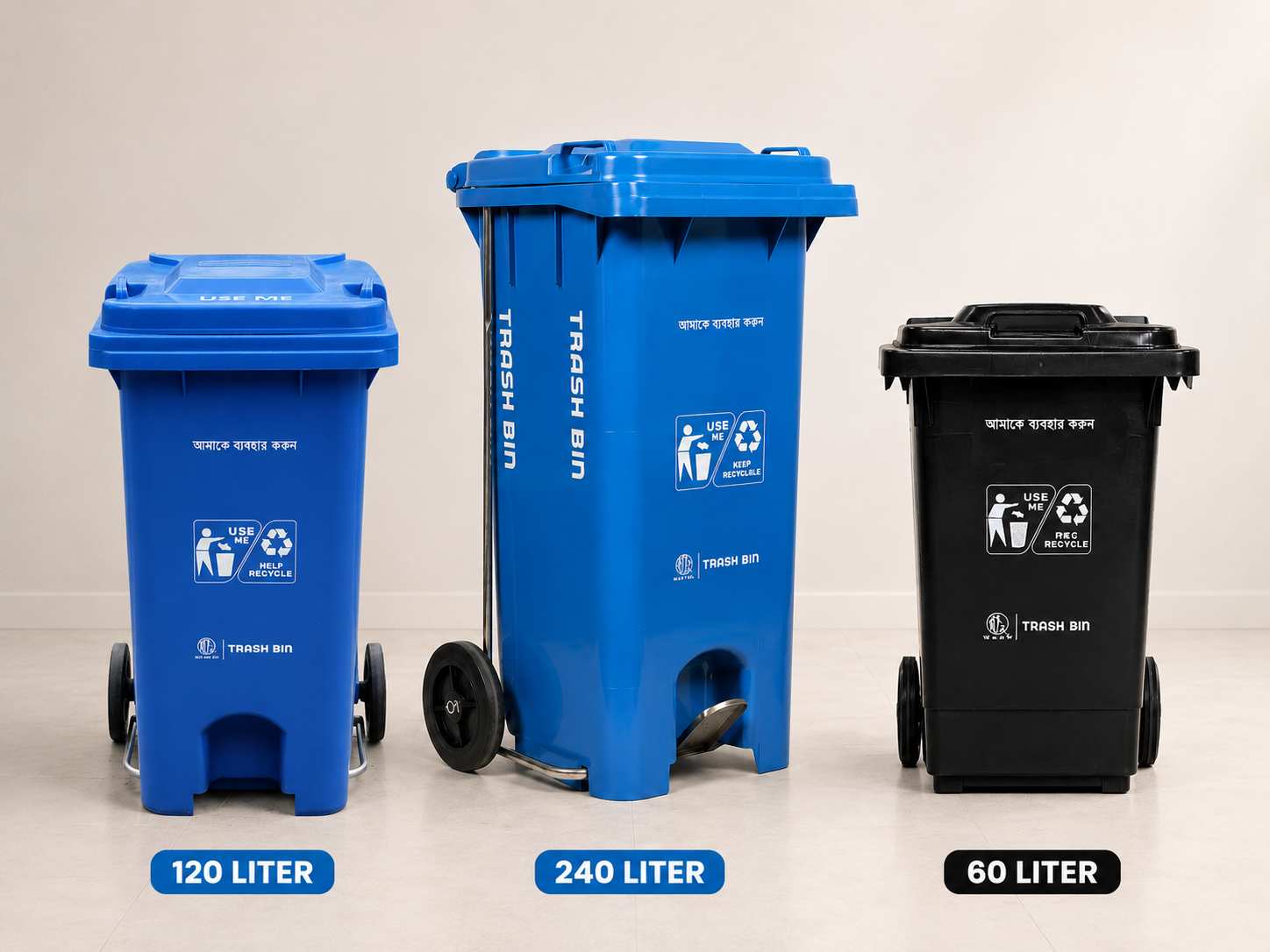 Three trash bins of different sizes with labels on a beige background