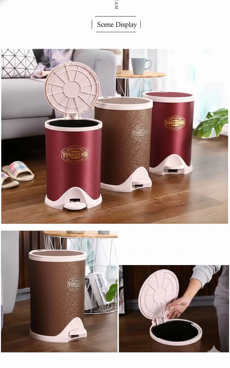 Set of three red and brown trash bins with lids on a wooden floor.