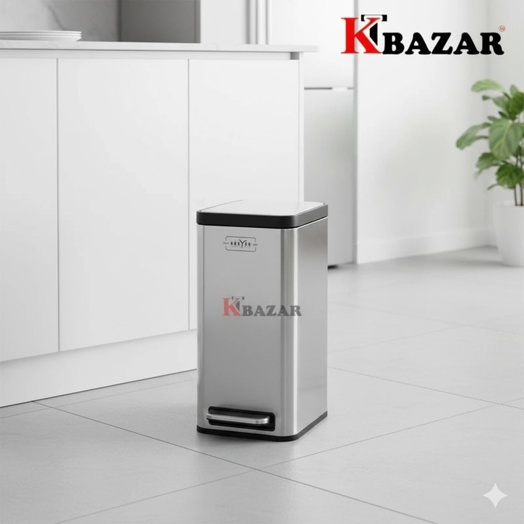 Stainless steel trash bin with black lid on a tiled floor, K-Bazar logo visible