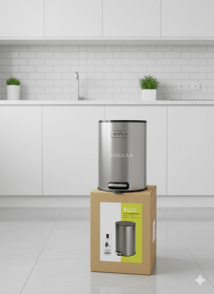 Silver kitchen trash can on a cardboard box with a kitchen background