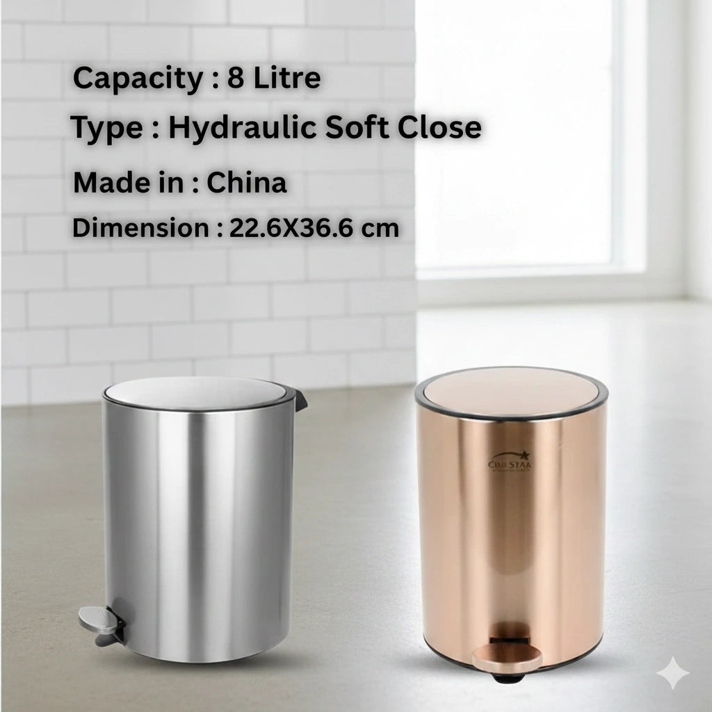 Two trash bins, one silver and one rose gold, on a light gray surface with a white tiled wall background.