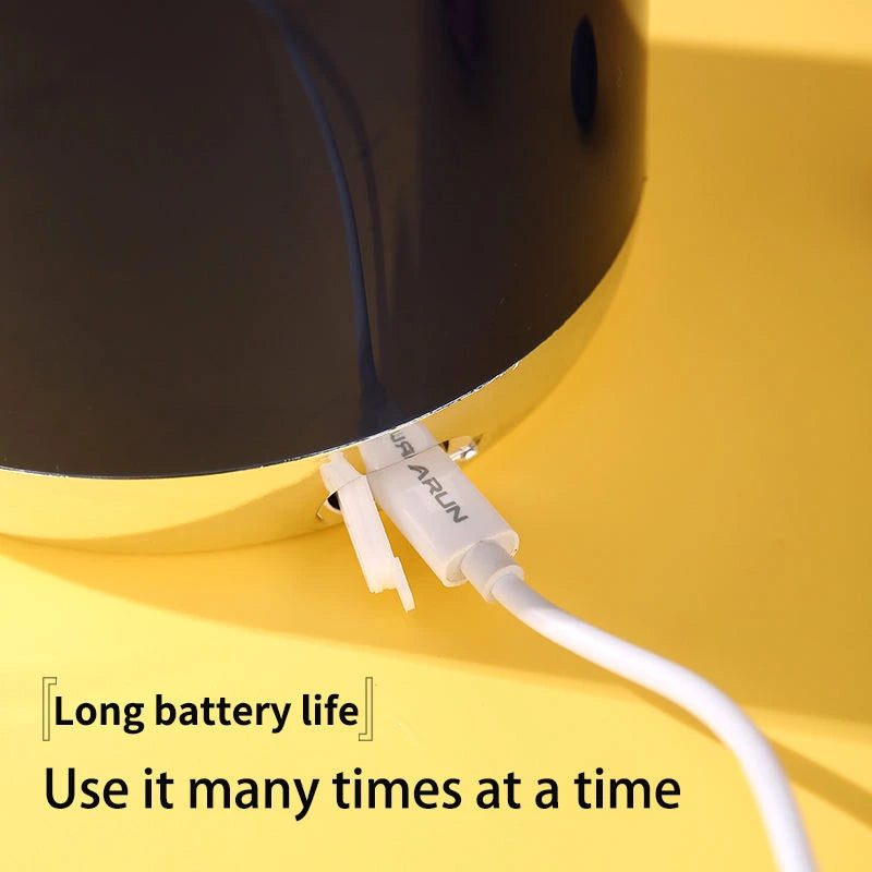 Close-up of a device with a cable on a yellow background, featuring text about long battery life.