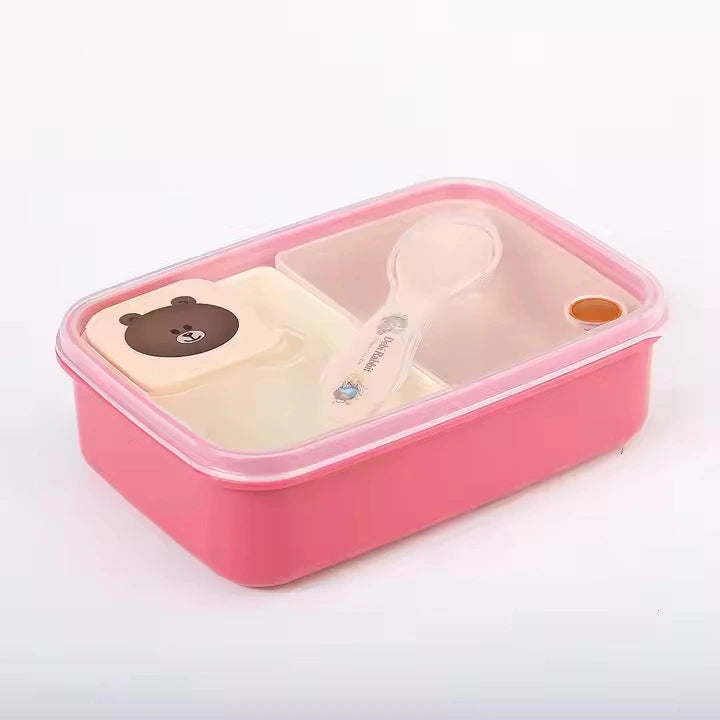 Pink bento box with a bear design on a white background