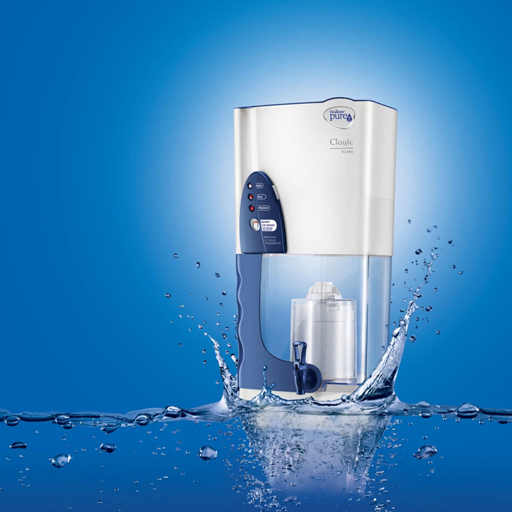 Pur water filter with water splashing around on a blue background
