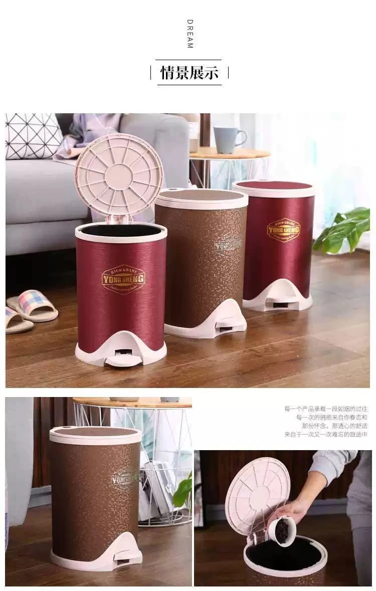 Set of three red and white trash bins on a wooden floor with a blurred indoor background.