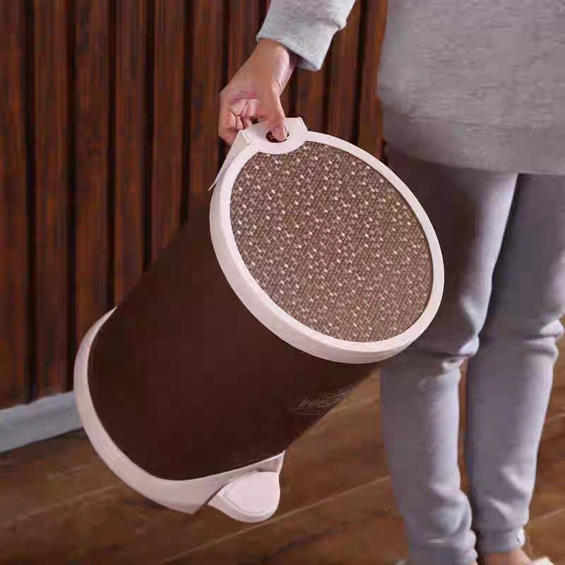Person holding a round pet scratching post with textured surface